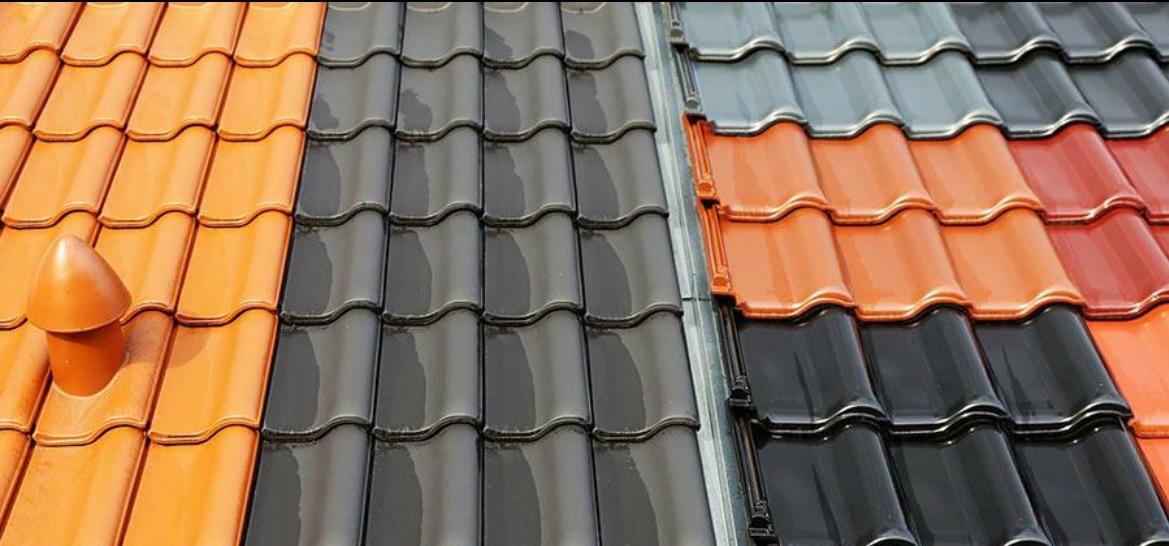 Roof tiles in terracotta, charcoal, red and black colours