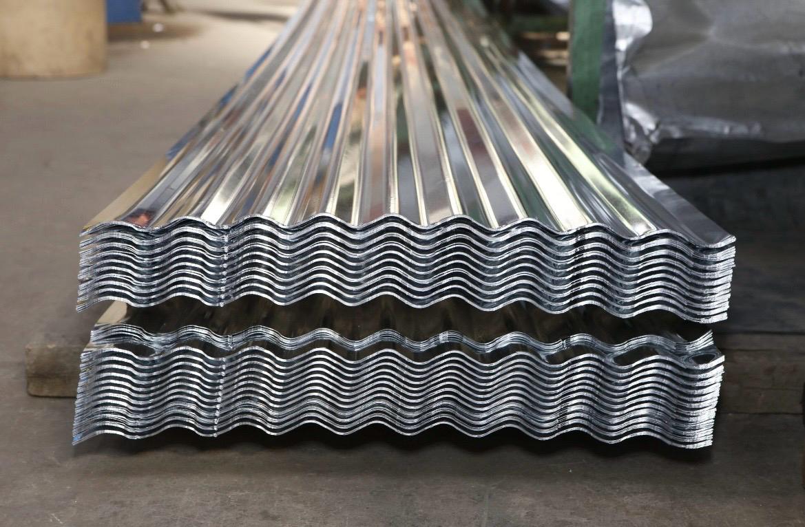 Stack of galvanized corrugated steel roof sheets in factory